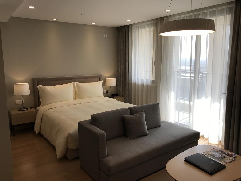 One Sunland Serviced Suites Managed By Lanson Place Şanghay Oda fotoğraf
