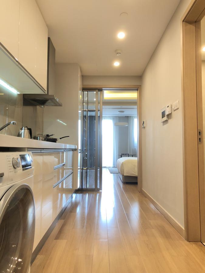 One Sunland Serviced Suites Managed By Lanson Place Şanghay Oda fotoğraf